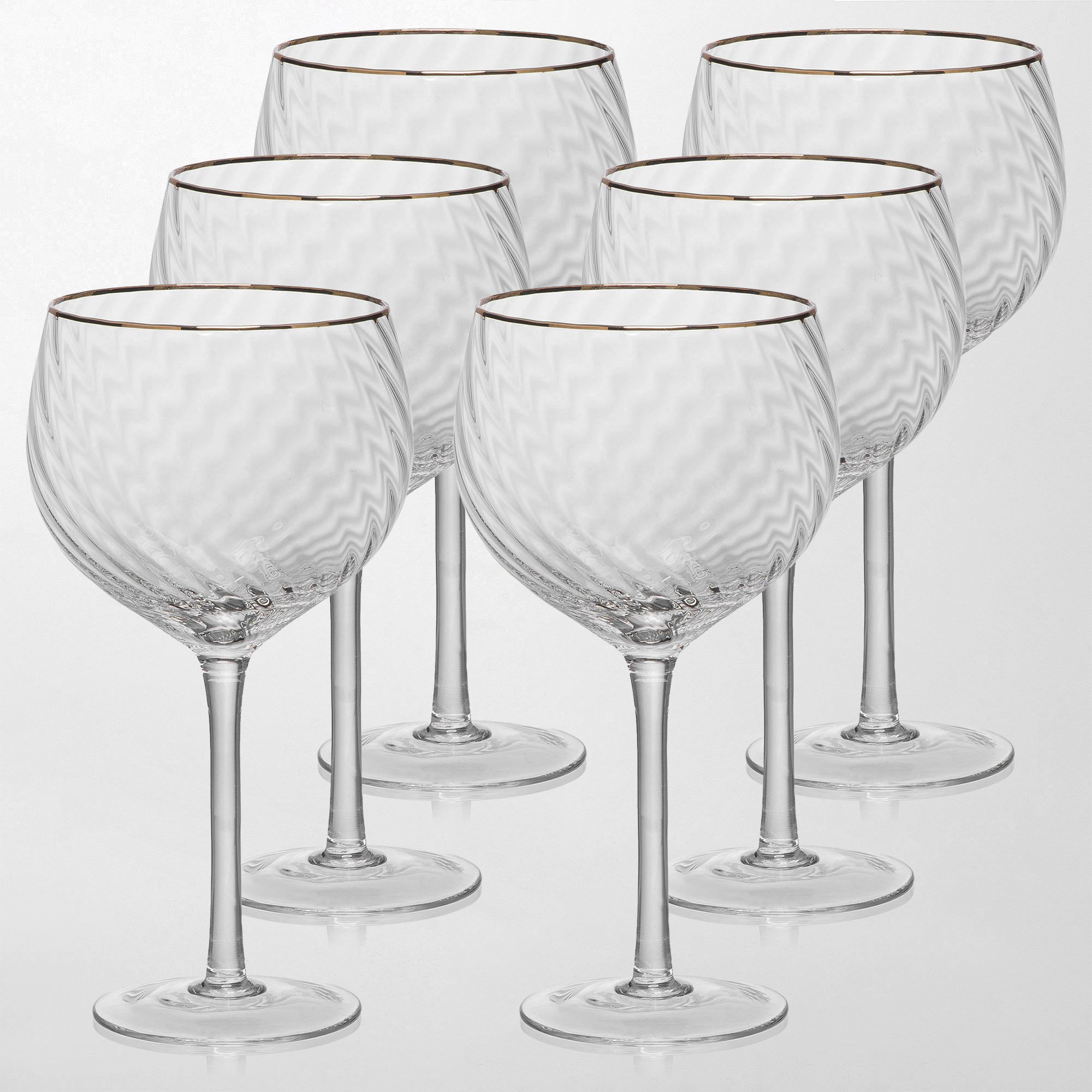 taca com borda dourada gin com seis lumina